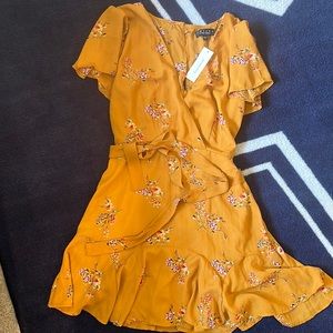 Francesca’s yellow floral mini dress
